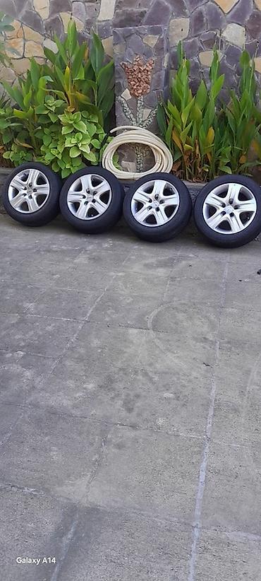 265 60 18 təkər satışı: Hyundai orijinal 15” yüngül lehimli disklərlə birlikdə komplekt təkər — 1