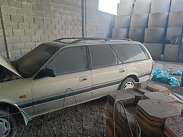 бак бенза: Mazda 323: 1990 г., 2 л, Механика, Бензин, Универсал — 2