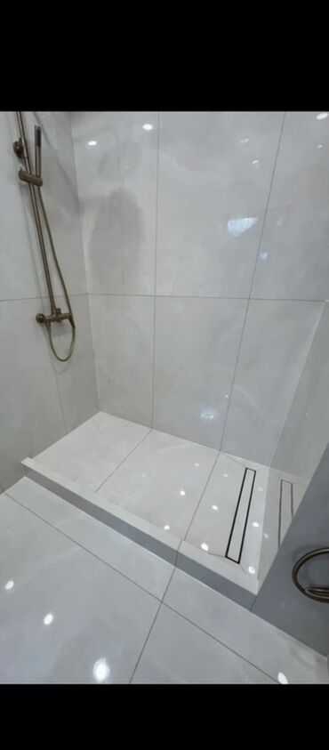 Укладка плитки: Услуги по облицовке ванных комнат и душевых плиткой/керамогранитом под — 2