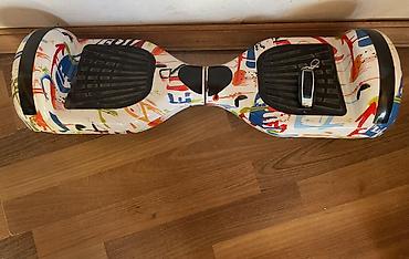hoverboard ikinci el: Elektrikli hoverboard – rəngarəng “graffiti” dizaynlı gövdə — 1