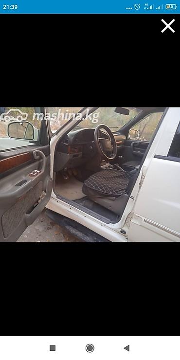 с номерами: Ssangyong Musso: 1999 г., 2.3 л, Механика, Дизель, Внедорожник — 2