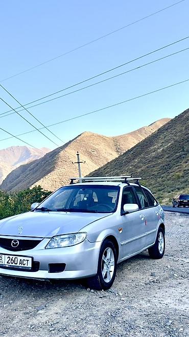 sprinter rex: Mazda 323: 2001 г., 2 л, Механика, Хэтчбэк — 2