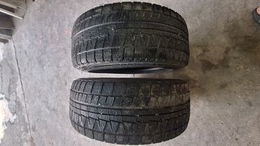 задание мост: Шины 235 / 45 / R 17, Зима, Пара, Легковые, Япония, Bridgestone