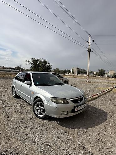 Mazda 323: 2002 г., 1.6 л, Механика, Бензин, Хэтчбэк