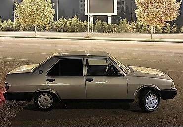 Tofas: Model: Tofaş Şahin (sedan) Kuzov: 4 qapılı, gümüşü rəng, qara plastik — 1