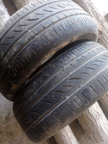 диска камри 16: Две автомобильные шины размером 185/55 R15 и 195/50 R15. пружина Мерс