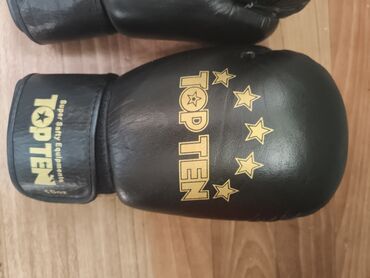 боксерские перчатки цена: TOP TEN 10oz оригинал

1 неделя, почти новые