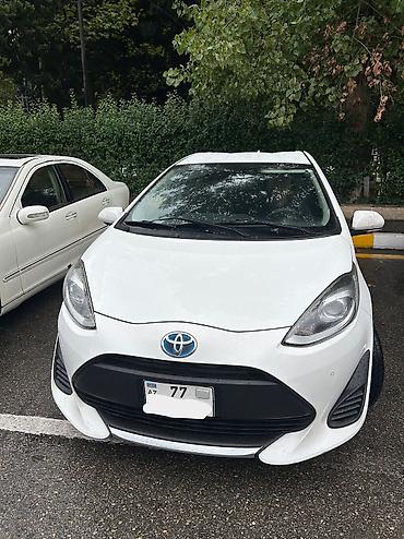 Toyota Aqua: 1.5 l | 2019 il Hetçbek