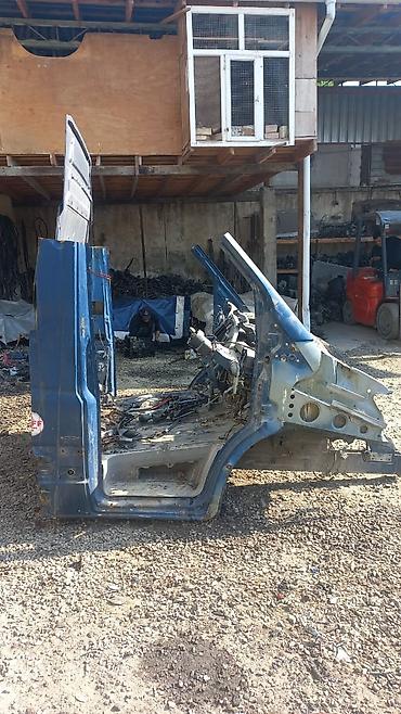 Другие детали кузова: Крыша (верхняя панель кузова) с вырезанными стойками. - Материал — 10