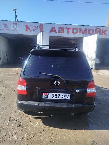 Mazda Demio: 2002 г., 1.5 л, Кол менен иштөөчү, Бензин, Хетчбек — 1