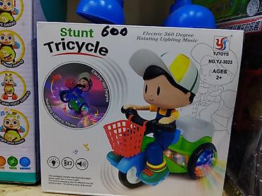 Игрушки: Игрушка «Stunt Tricycle» (YJTOYS, модель YJ-3023) - Электрический — 1
