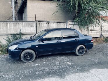 Mitsubishi: Mitsubishi Lancer: 2004 г., 1.6 л, Механика, Бензин, Минивэн