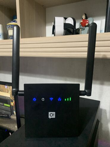 пассивное сетевое оборудование оптические: Роутер Oi! 4G LTE Wi-Fi – это компактное устройство черного цвета