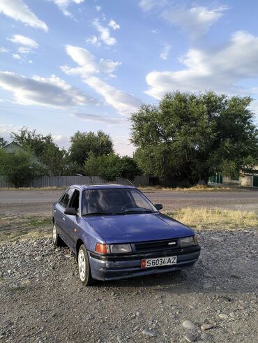 авто тундра: Mazda 323: 1990 г., 1.6 л, Механика, Бензин, Седан