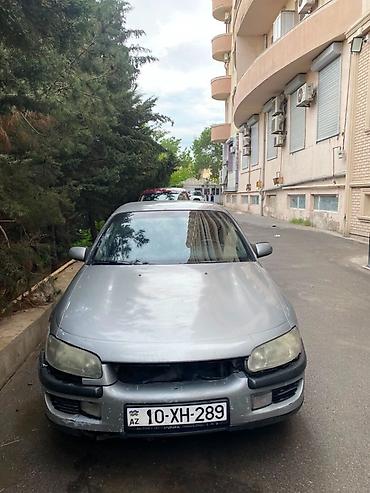 opel omega: Opel Omega: 2.5 l | 1994 il Sedan — 2