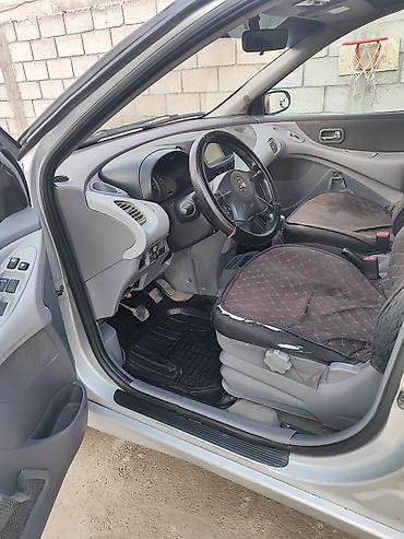e klass: Nissan Almera Tino: 2002 г., Хэтчбэк — 9