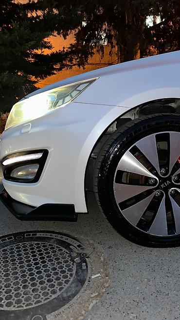 kia carnival: Kia Optima – ağ rəng, sedan, idman üslublu eksteryer paketli. Əsas — 9
