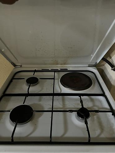indesit: Газовая плита Indesit с электродуховкой и комбинированной варочной — 1