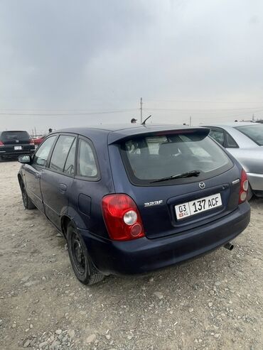 цена домкрата для легкового автомобиля: Mazda 323: 2003 г., 1.6 л, Механика, Бензин, Хэтчбэк