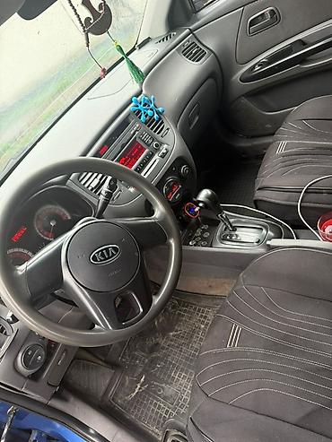 амартизаторы: Kia Rio: 2011 г., 1.4 л, Автомат, Бензин, Седан — 6