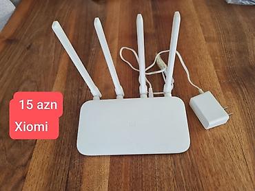 macbook pro adapter: Xiaomi Wi‑Fi router, 4 xarici antenalı model. Ev və ofis istifadəsi — 1