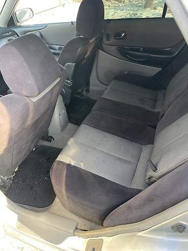 Mazda: Mazda 323: 2003 г., 1.6 л, Бензин, Универсал — 16