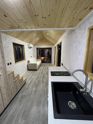 Konteynerlər: Modul tipli mobil ev – “tiny house” Xüsusiyyətlər: - Daşınan — 5