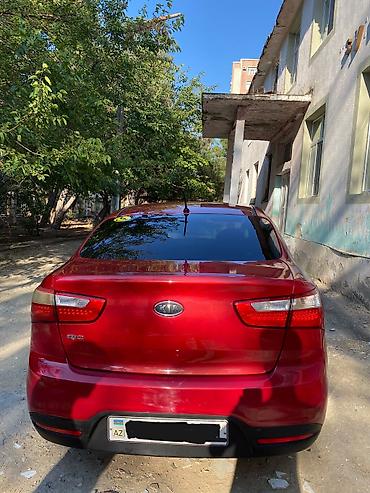 kia bongo: Kia Rio sedan – qırmızı rəng - Kuzov: 4 qapılı sedan, parlaq qırmızı — 2