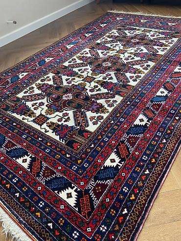 puzzle xalça: 60 ildən çox yaşı olan Qubanın məhşur "Ağ gül" kompazisiyası olan əl — 2
