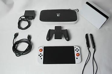 Nintendo Switch: U ponudi je Nintendo Switch OLED (čipovan). Memorija: 256 GB + 64 GB — 3