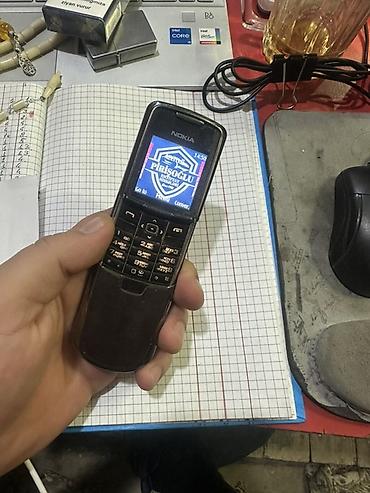 Мобильные телефоны: Nokia цвет - Серебристый, Кнопочный — 1