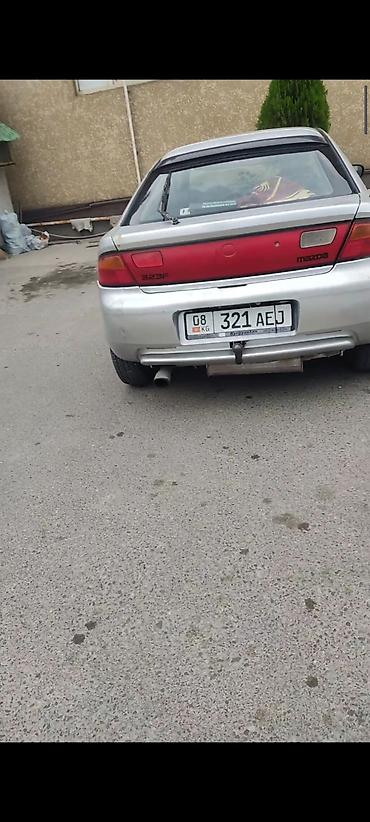 e34 2 5: Mazda 323: 1996 г., 1.5 л, Механика, Бензин, Лифтбек — 2