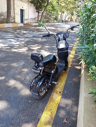 yük daşıyan maşınlar: Elektrik skuter – şəhər içi rahat və səssiz hərəkət üçün — 2