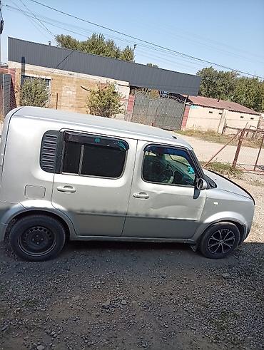 авто в такси: Nissan Cube: 2003 г., 1.3 л, Автомат, Бензин, Минивэн — 2