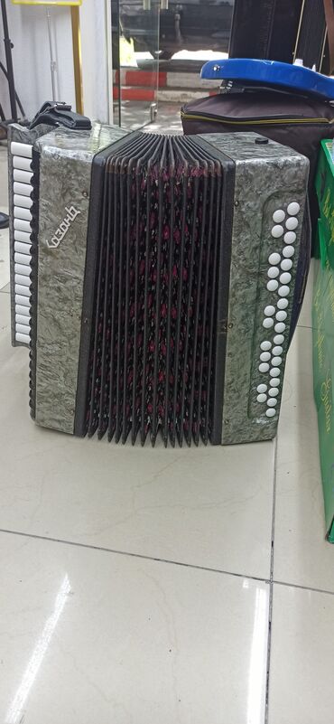 Qarmonlar: Qarmon, Ünvandan götürmə