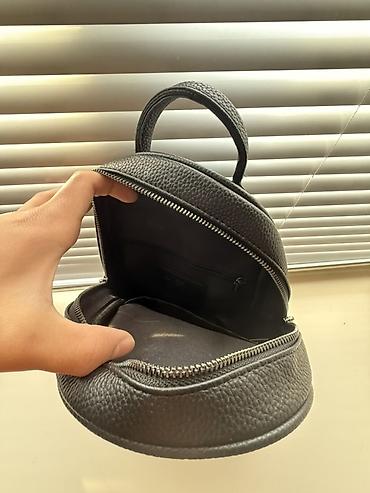 Рюкзаки: Сумка Coach Компактная барсетка из черной фактурной кожи с тисненным — 7