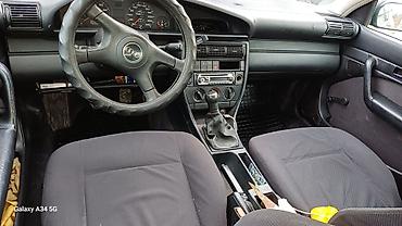 консоль 124: Audi 100: 1991 г., 2.3 л, Механика, Седан — 2