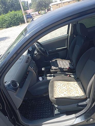 коврик: Mazda Demio: 2005 г., Автомат, Бензин, Хэтчбэк — 4