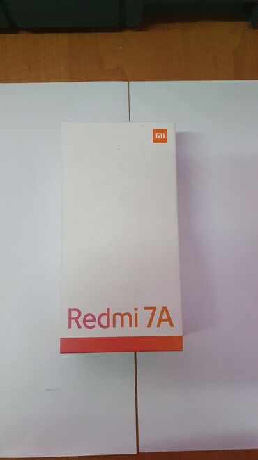 телефоны редми: Xiaomi, Redmi 7A, Колдонулган, 32 GB, түсү - Көк, 1 SIM, 2 SIM