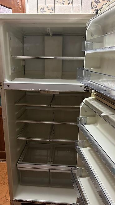 Soyuducular: İşlənmiş 2 qapılı Mabe Soyuducu Satılır, rəng - Bej, Təkərli — 1