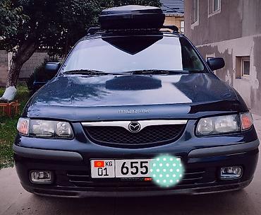 g comp: Mazda 626: 1999 г., 1.8 л, Механика, Бензин, Седан — 1