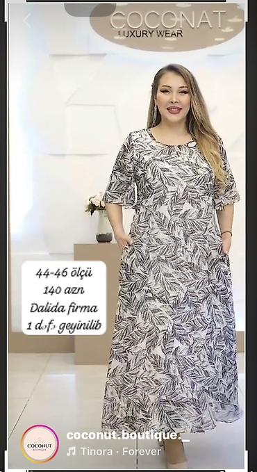 kofta qadin: - Darkwin firma: qara, düyməli, kofta/kimono tipli uzun tunik. Yuxarı — 2