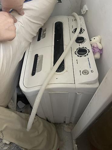 philips xenium x703: İkikameralı mini paltaryuyan maşın Xüsusiyyətlər: - Model: TWM8600 — 1