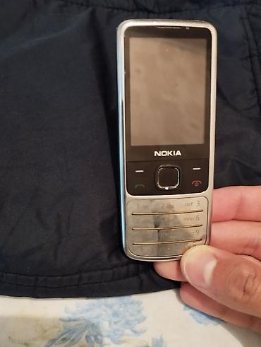 retro telefon: Nokia 6700 Slide, < 2 GB Memory Capacity, rəng - Gümüşü, Düyməli — 2