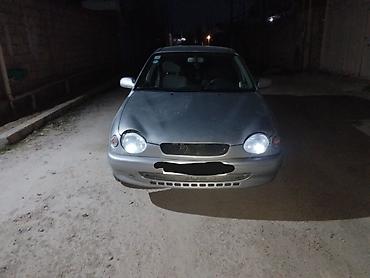 Toyota: Toyota Corolla: 1.6 л | 1999 г. Седан — 5