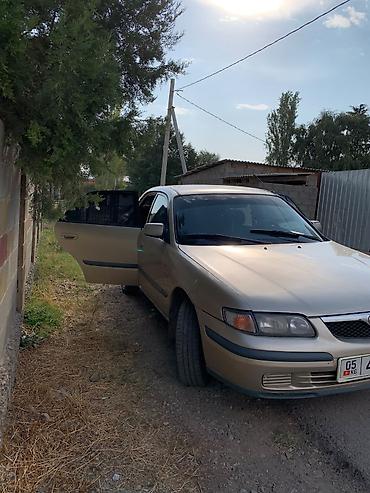 нисан афтамат: Mazda Familia: 1998 г., 1.8 л, Механика, Бензин, Седан — 7