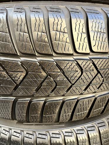зимный сапок: Шины 215 / 55 / R 17, Всесезонная, Б/у, Комплект, Германия, Pirelli — 2