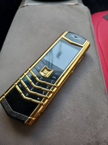 телефон fly ds133: Vertu Aster, Düyməli