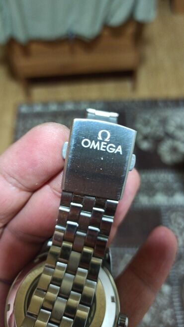 Qol saatları: İşlənmiş, Qol saatı, Omega, rəng - Gümüşü — 8