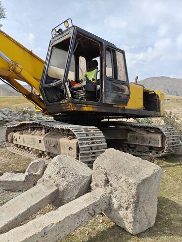 пресспадборшик кыргызтан: Экскаватор, Гусеницалуу